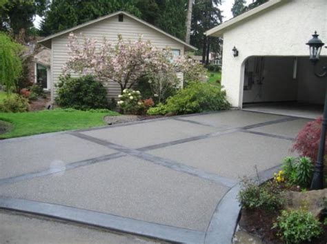 Concrete pads with black Mexican | Concrete patio designs, Stamped concrete driveway, Stamped ...