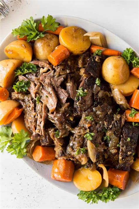 Slow Cooker Pot Roast with Potatoes and Carrots - Spoonful of Flavor