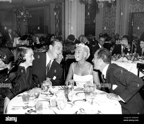 JOHN WAYNE and his Mexican second wife ESPERANZA BAUR with KEENAN WYNN ...