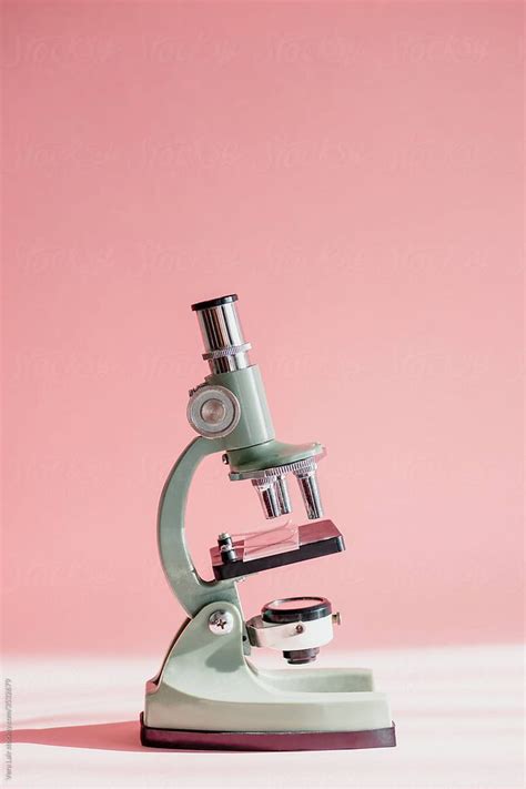 "Small Microscope On A Pink Background" by Stocksy Contributor "Vera ...