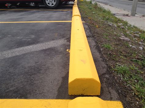 Sure Seal Pavement Maintenance Inc. Provides Recycled Parking Curbs in Toronto