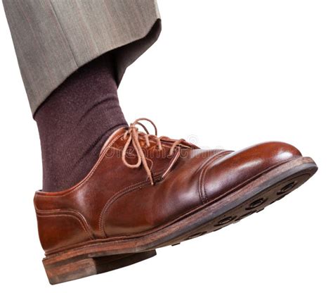 Male Right Foot In Brown Shoe Takes A Step Stock Image - Image of walk ...