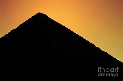 Silhouette of the Great Pyramid of Giza at sunset Photograph by Sami Sarkis - Pixels