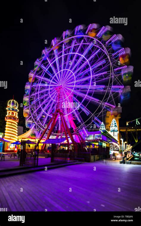 Luna Park ferris wheel at night during Vivid, the annual popular light festival in Sydney ...