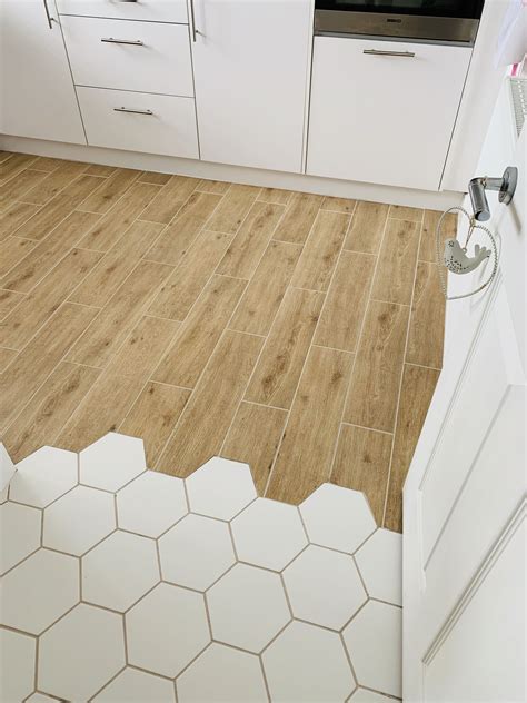 White hexagon kitchen floor tiles | Hexagon tile kitchen floor, Kitchen flooring, Tile to wood ...