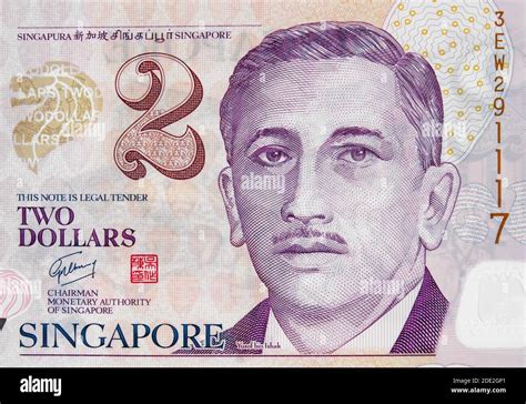 Yusof bin Ishak portrait on Singapore 2 dollar banknote closeup macro, Syngaporean money close ...