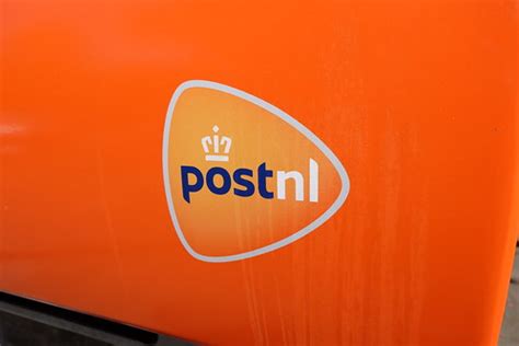 PostNL logo | Logo of Dutch mail corporation PostNL on a sta… | Flickr