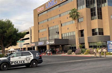 Las Vegas police officers gather at University Medical Center on ...