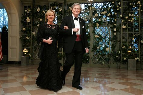 Senator Kennedy and his wife arrive for the State Dinner in honor of French President Macron at ...