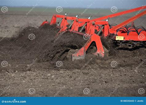 Harrowing The Soil With Tine Harrows Royalty-Free Stock Photo | CartoonDealer.com #153180861