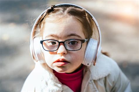 Close Up Portrait of Beautiful Little Girl in Eyeglasses with Down ...