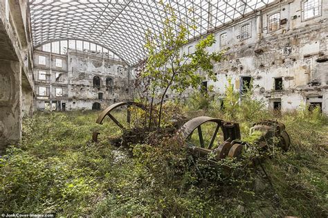 Abandoned buildings around the world now teeming with plant-life after ...