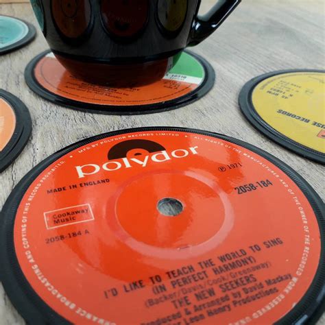 set of six vinyl record coasters by vinyl village | notonthehighstreet.com