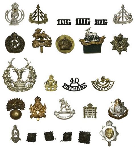 139 - A selection of cap and uniform Badges Including Punjab Regiment...