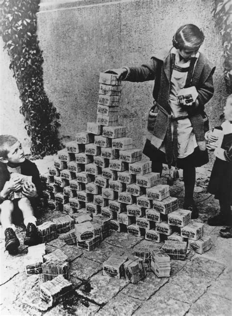 Children playing with tons of cash that became worthless after WWI in ...