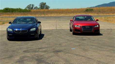 Audi A7 vs. BMW 640i Gran Coupe - Video - CNET