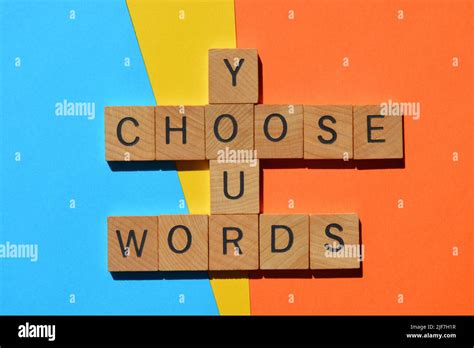 Choose Your Words, in wooden alphabet letters in crossword form isolated on colorful background ...