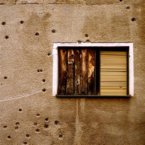 Bullet Hole Wall Stock Photos, Pictures & Royalty-Free Images - iStock