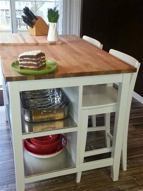 IKEA's Butcher block table with stainless steel shelves....visit ikea ...