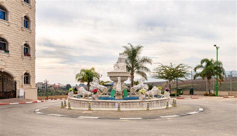 A Square Decorated with a Decorative Fountain in the Ghajar Alawite ...