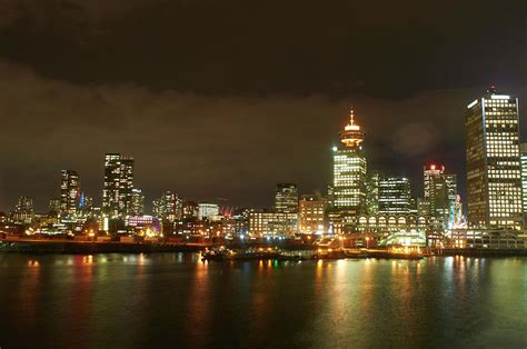 Vancouver Skyline Lit Up At Night by Peter Muller