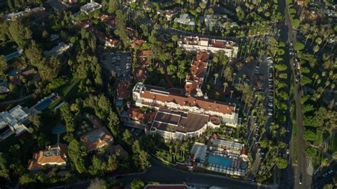 8K stock footage aerial video of a reverse view of the Beverly Hills Hotel in Beverly Hills ...