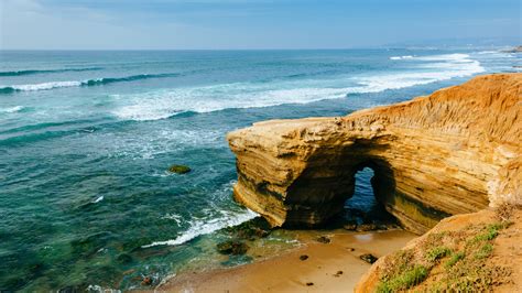 Everything You Need to Know About Sunset Cliffs Cave - Getaway Couple