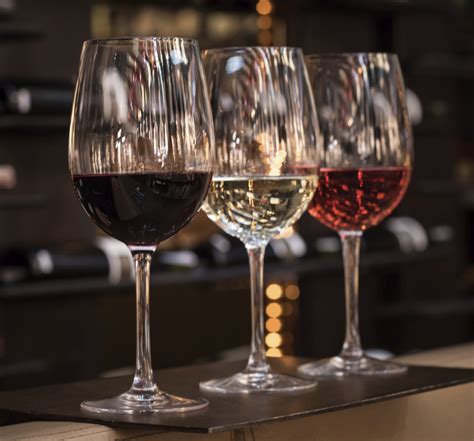 Three glasses of wine: red, white and rose - The Best Steakhouse & American Cuisine