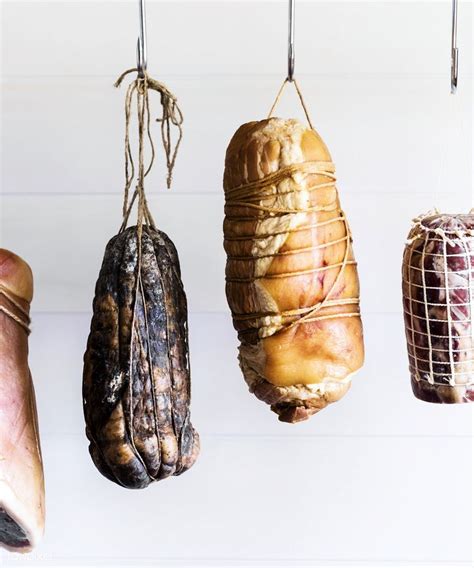 Download premium image of Cured meat hanging in a deli shop 485465 ...