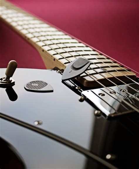 Pick o Black Electric Guitar · Free Stock Photo