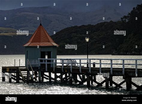 Akaroa harbour New Zealand Stock Photo - Alamy