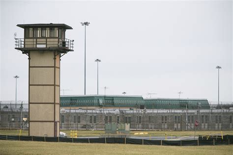 Prosecutors drop most remaining cases in fatal prison riot | AP News