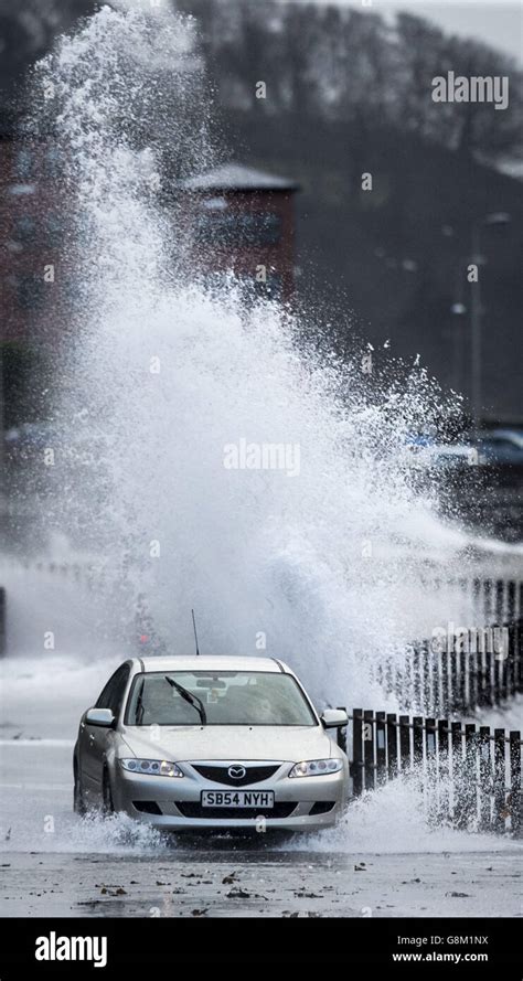 Car cars sea waves weather spray splash hi-res stock photography and images - Alamy