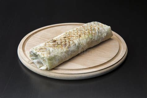 Lavash Bread Wrap On Wooden Desk. Traditional Dish Wrapped In Lavash. Stock Image - Image of ...