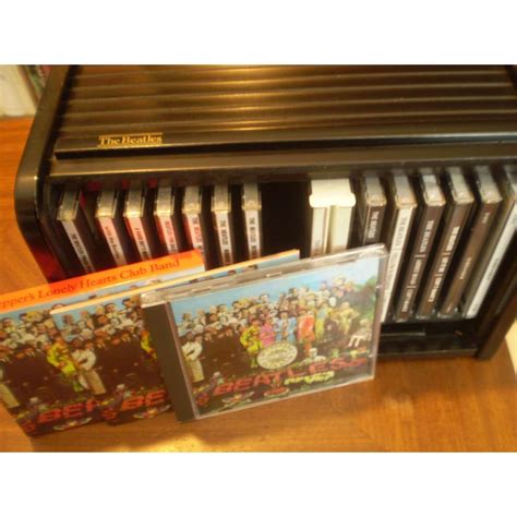 The beatles box set / wooden roll box 16 cd (13 albums dont 1 double + 2 cd past masters) by The ...