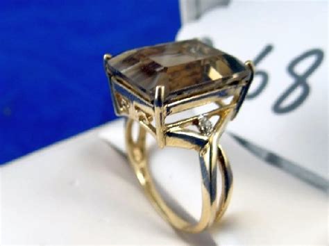 68: 10K & 8CT Brown Topaz Ring W/Diamond : Lot 68