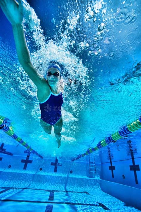 Woman swimming underwater stock image. Image of underwater - 13585323