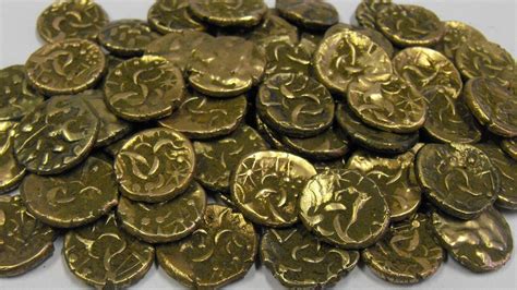 Iron Age coin hoard purchased by Cambridgeshire museum - BBC News