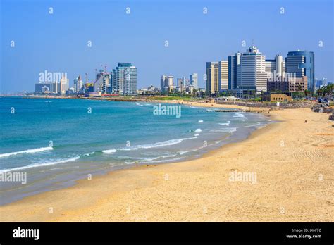 Sand beach and the modern skyline of Tel Aviv city, Israel Stock Photo ...