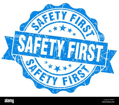 safety first blue grunge seal isolated on white Stock Photo - Alamy