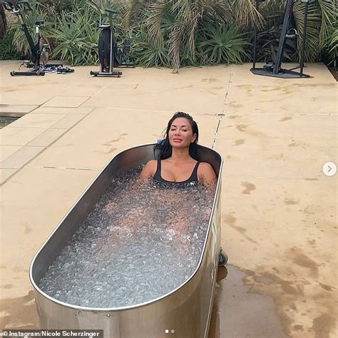 Nicole Scherzinger sizzles in a black bikini as she submerges in a ...