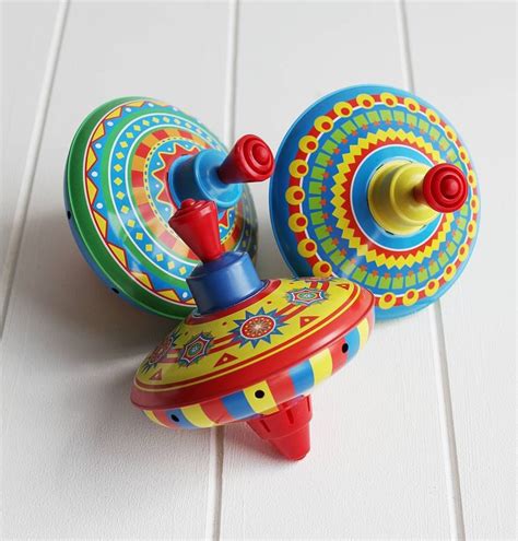 Traditional Tin Spinning Top | Traditional toys, Spinning top, Spinning