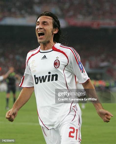 Andrea Pirlo of Milan celebrates after taking the free kick, that ...