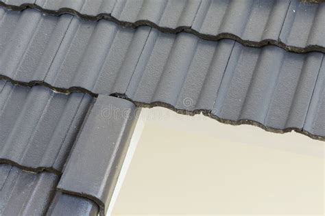 Black roof tiles on house stock photo. Image of industrial - 49360912