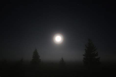 Lunar Coronas Form Rings Around The Moon - Haunting Sky Phenomena