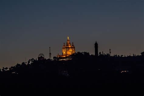 Premium Photo | Night view of tibidabo mountain barcelona