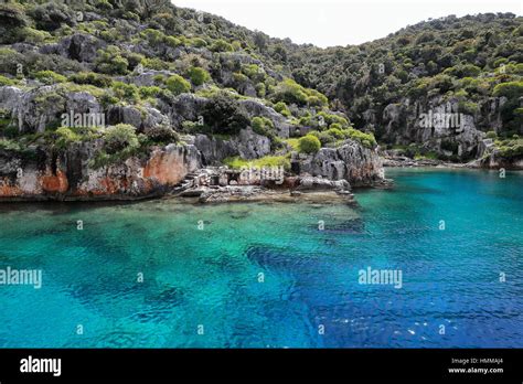 Sunken ruins in Kekova island of Dolichiste ancient Lycian town facing ...