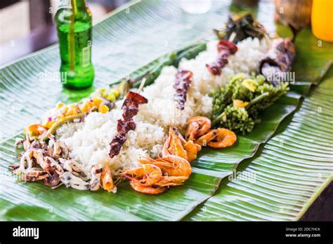 A budol fight food spread served at a restaurant in Palawan ...