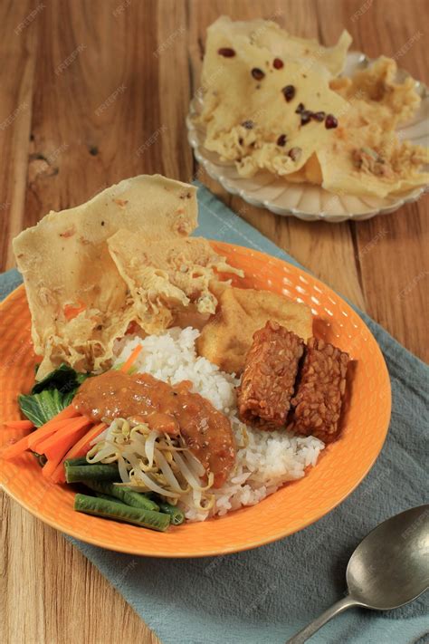 Premium Photo | Nasi pecel. boiled vegetable with spicy peanut sauce ...