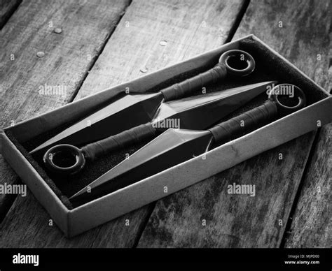 black and white throw ninja weapons Stock Photo - Alamy